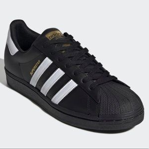 Adidas superstar sneakers.